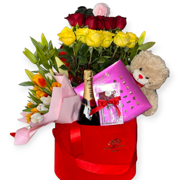 Rose and Tulip Bouquet with Champagne, Chocolates, and Teddy Bear