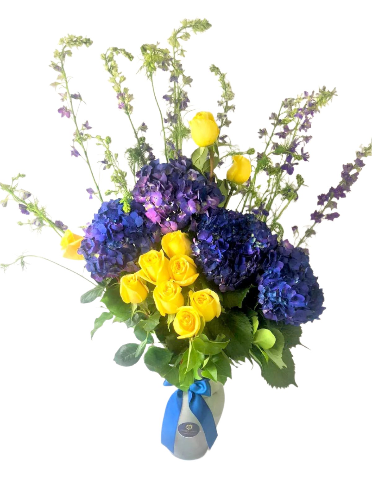 Centerpiece made of Yellow Roses and Blue Hydrangeas