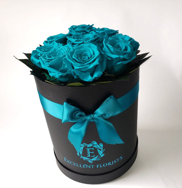 This beautiful arrangement of Excellent Flowers ETERNITY preserved roses is arranged for beauty and durability. They create a long-lasting impression which is sure to make someone a happy time and time again.