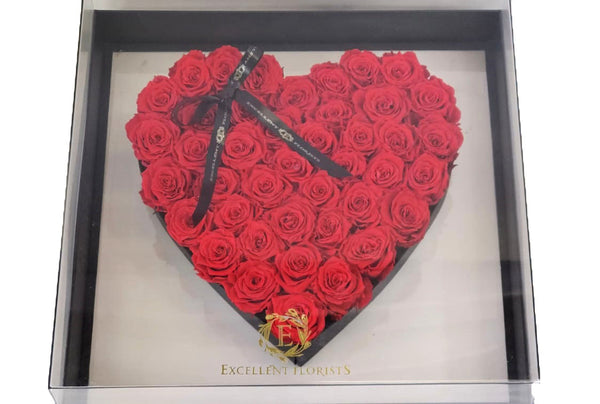 Luxurious Heart of 68 Red Preserved roses in a clear box