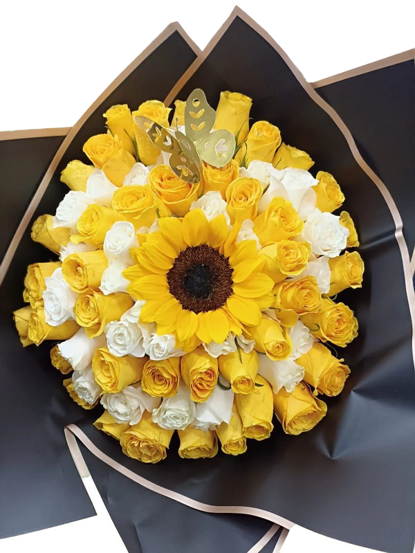 A floral arrangement of 75 roses including sunflowers and various other flowers in shades of yellow, white, and gold, wrapped in a black and gold-colored paper.