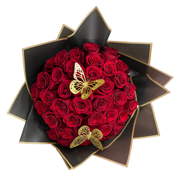 Bouquet of red roses with gold butterflies