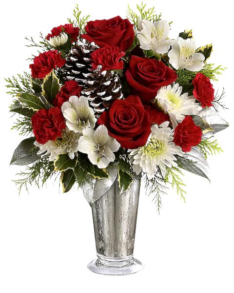 Arreglo navideño con rosas rojas, crisantemos blancos y piñas decorativas en base metálica.