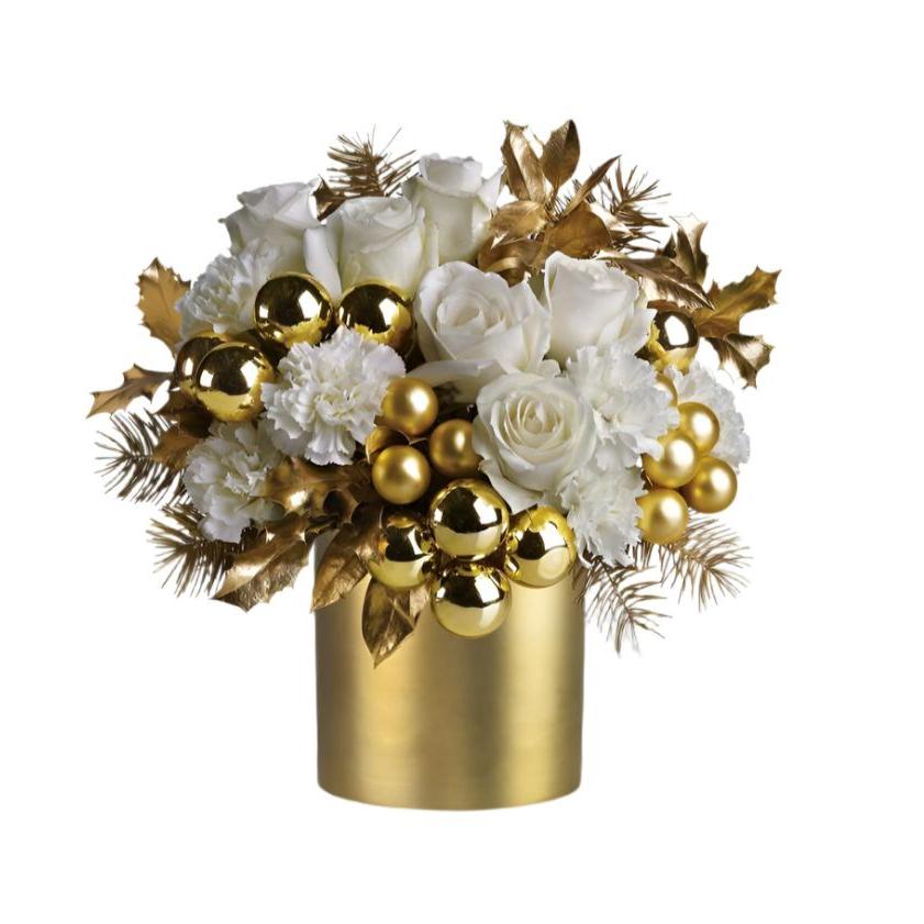 Golden Christmas Glow Christmas centerpiece with white roses, carnations, gold ornaments and metallic foliage in a gold vase