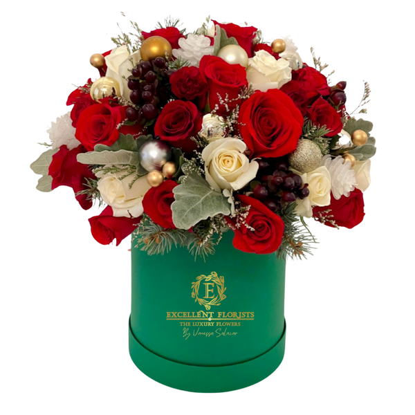 Holiday Harmony Rose Box with red and white roses in a luxury green box with festive holiday details