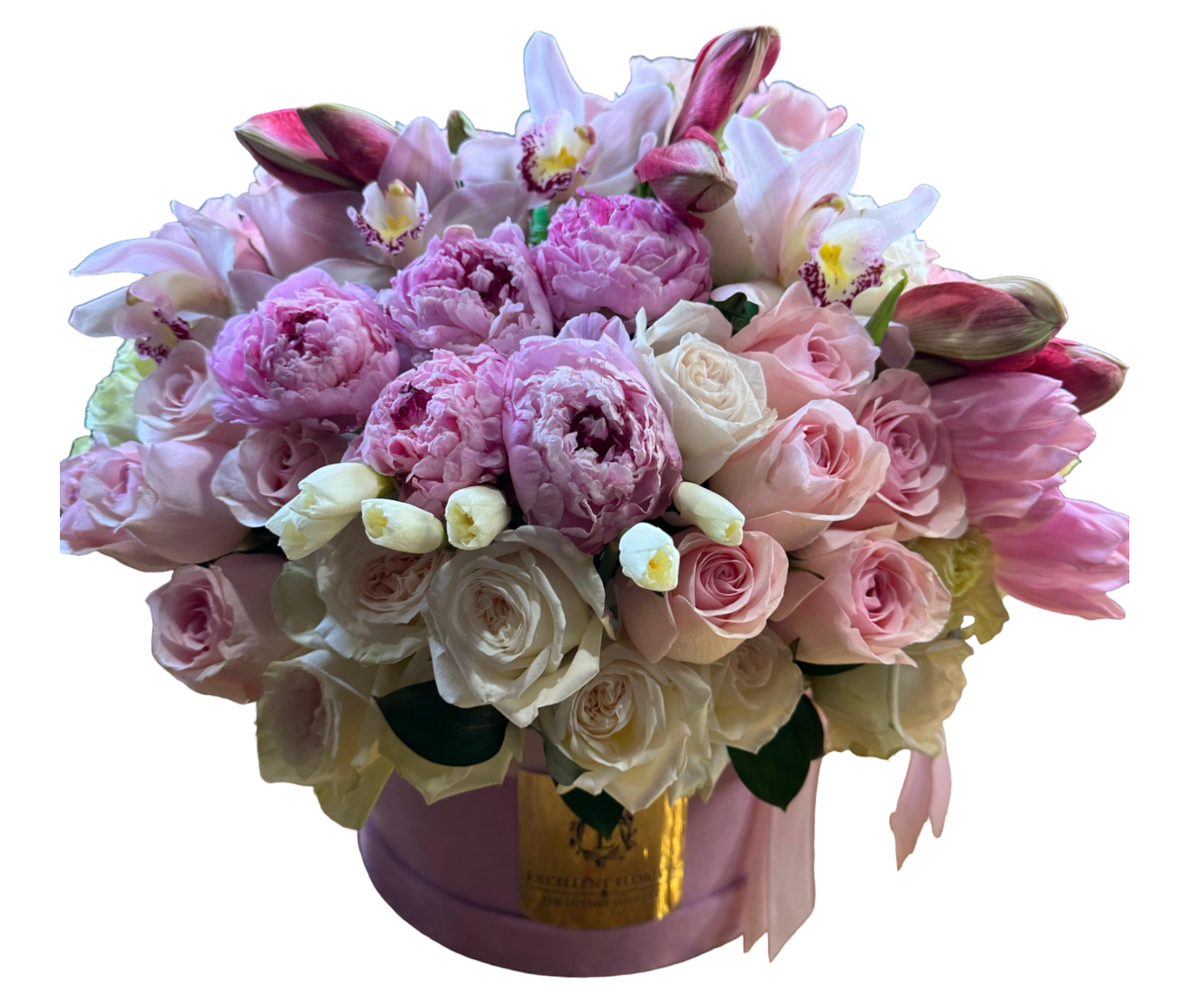 A luxurious floral arrangement in a pink velvet box featuring pink peonies, soft blush roses, vibrant tulips, and delicate pink cymbidium orchids.