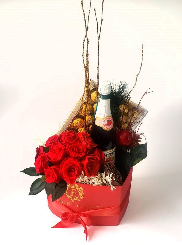 Preserved Roses, Chocolate and Sparkling apple in a heart box.