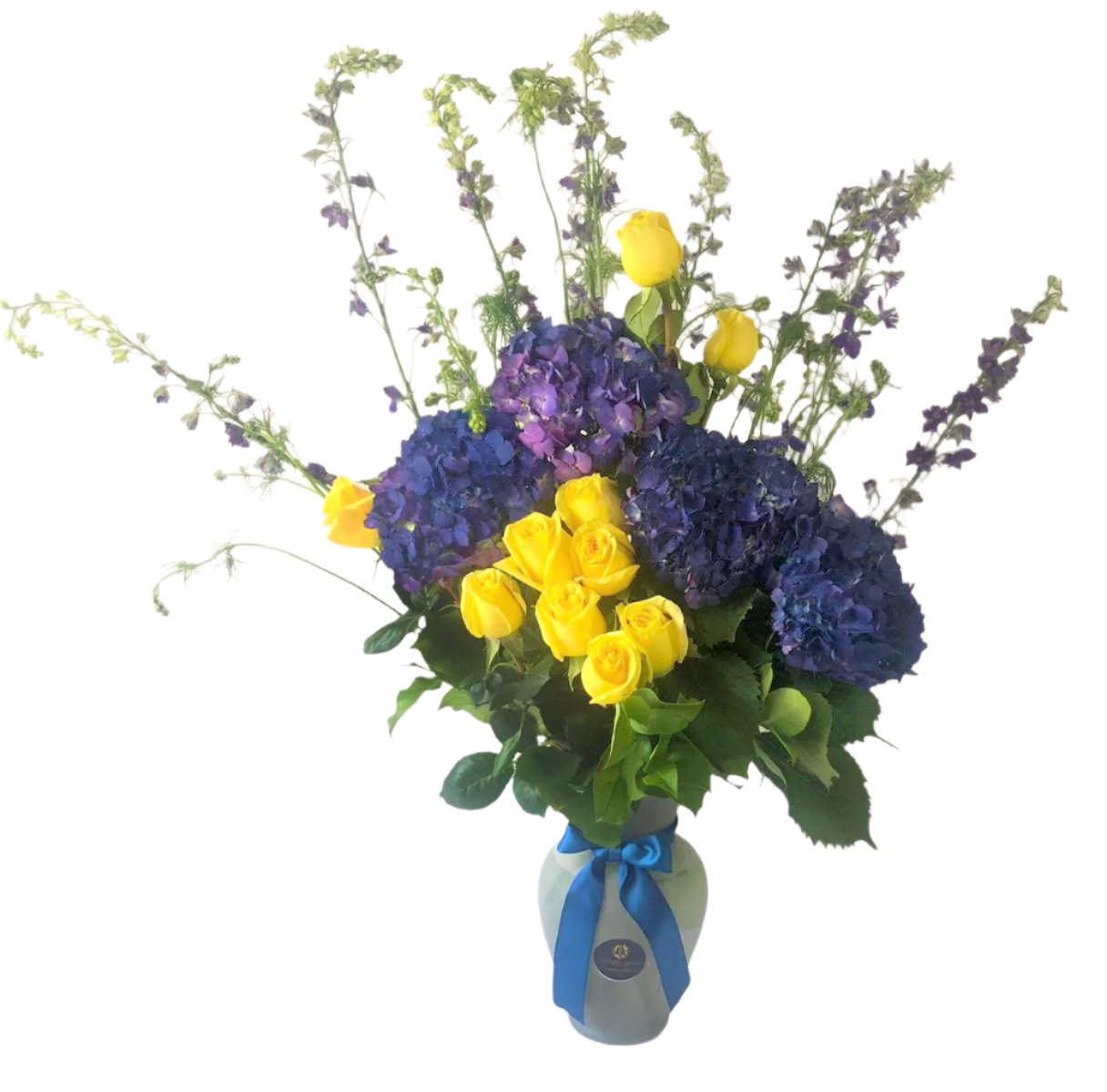 Centerpiece made of Yellow Roses and Blue Hydrangeas