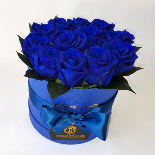 Small Royal Blue Preserved Rose .This beautiful arrangement of Excellent Flowers ETERNITY preserved roses is arranged for beauty and durability. They create a long-lasting impression which is sure to make someone a happy time and time again.