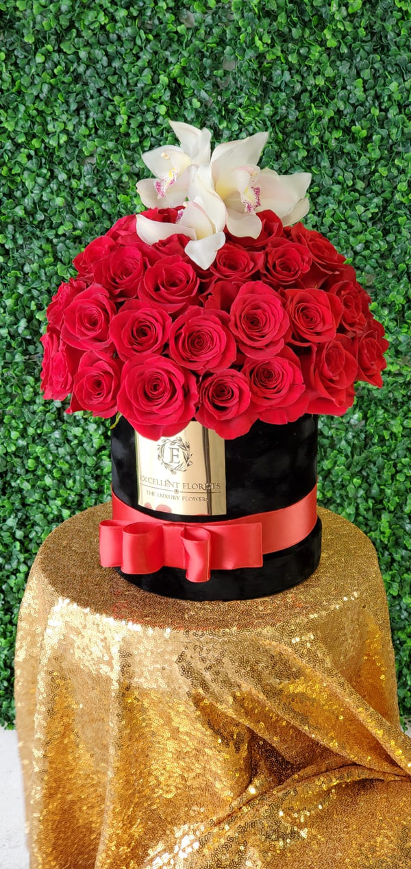 Red roses & orchids in a luxury box