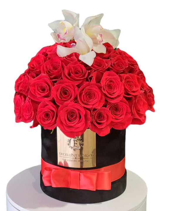 Red roses & orchids in a luxury box