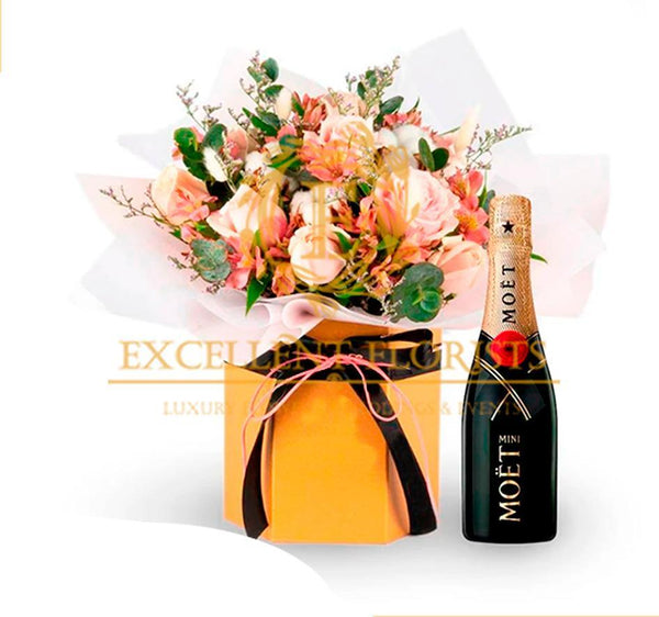 Pink roses, orchids, and Moet Champagne