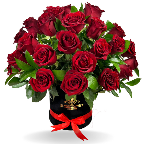 Two dozen premium red roses arranged in a luxury round box, elegant romantic floral arrangement by Excellent Florists