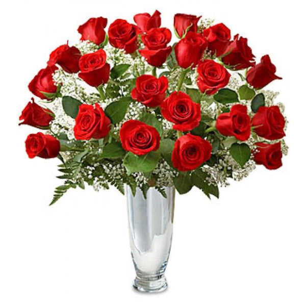 24 long-stem Ecuadorian red roses arranged with greenery in a glass vase