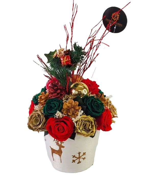 Eternity Christmas preserved roses arranged in an elegant white festive vase by Excellent Florists