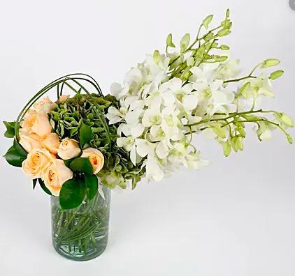 Orchids, Roses and White Hydrangeas in a Vase