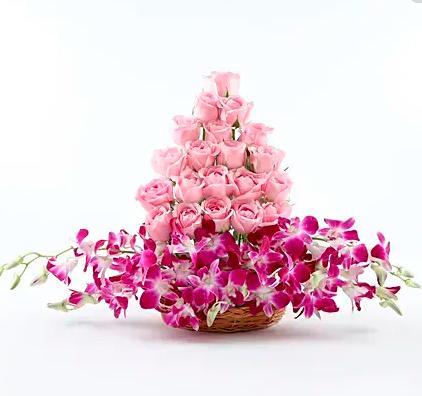 Pink Roses and Orchids in a basket
